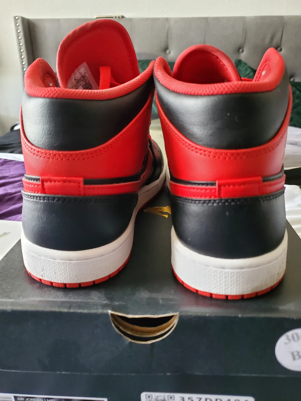 Jordan High-Top Sneakers in Black and Red